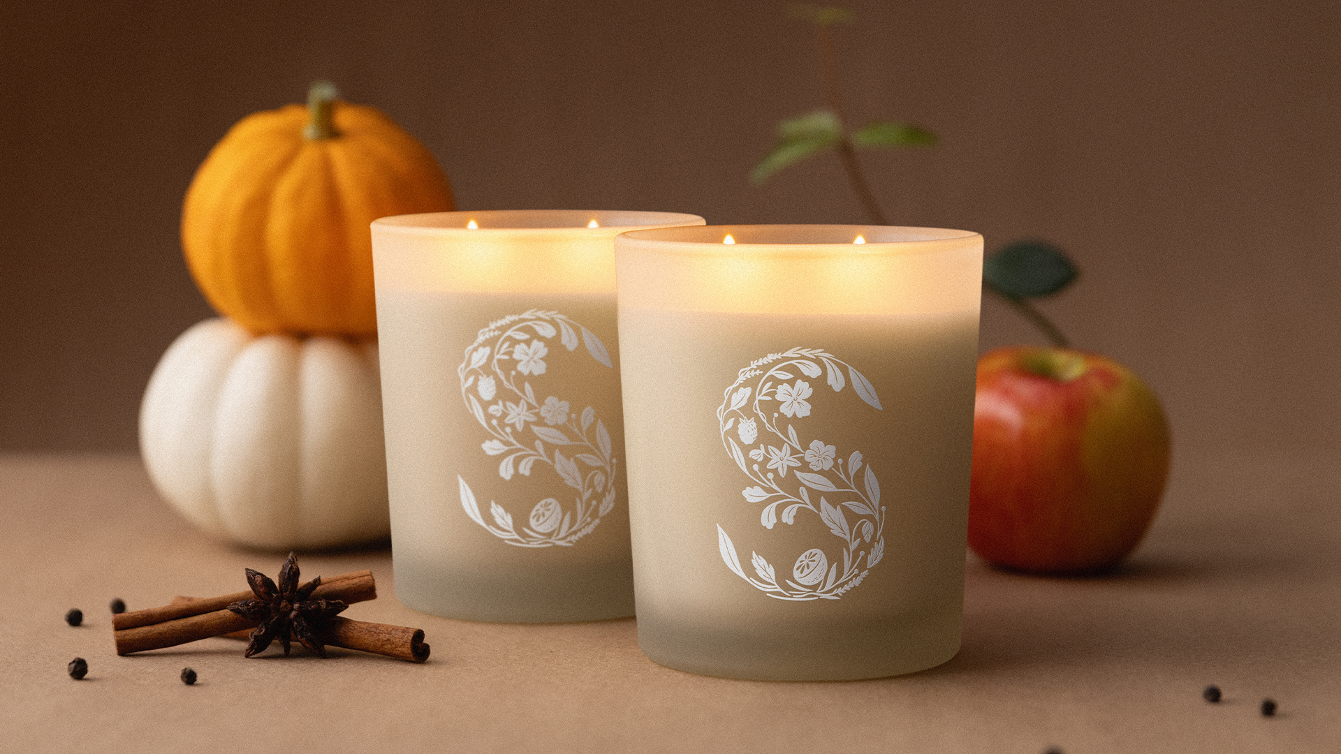 A beautiful display of Scentsy Scented Candles casting a warm glow on a decorative living room table